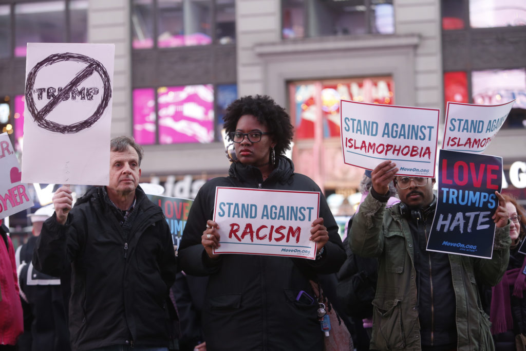 "NEW YORK, NY - MARCH 16: Members of MoveOn.org Political Action stand outside the studios of "Good Morning America" to broadcast messages of love, dignity, and equality and stand up against the hate, racism, and incitement of violence that the group says has become a hallmark of Donald Trump's presidential campaign in New York City on Wednesday, March 16, 2016 in New York City. (Photo by Thos Robinson/Getty Images for MoveOn.org Political Action)"
