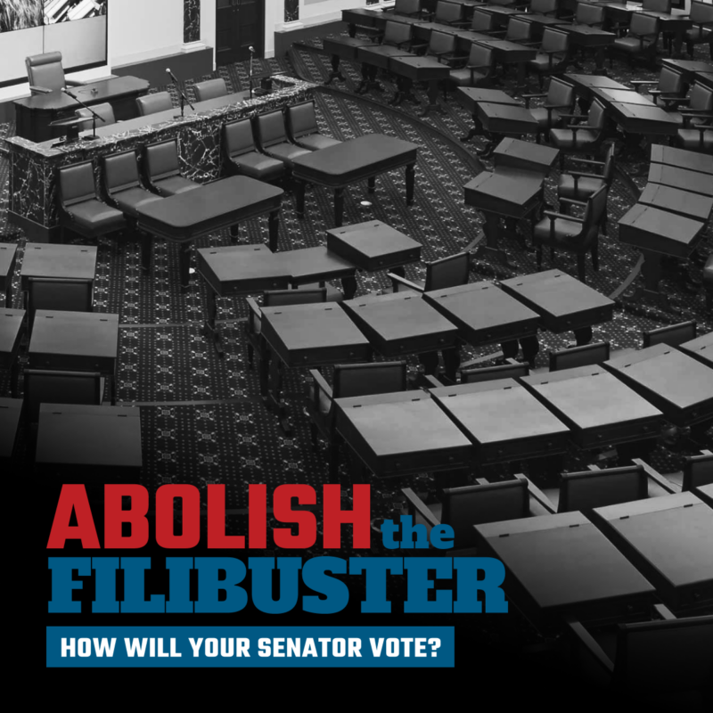 Black and white image of the empty interior of the U.S. Senate with copy in the lower left-hand corner that reads: "Abolish the Filibuster. How will your senator vote?"