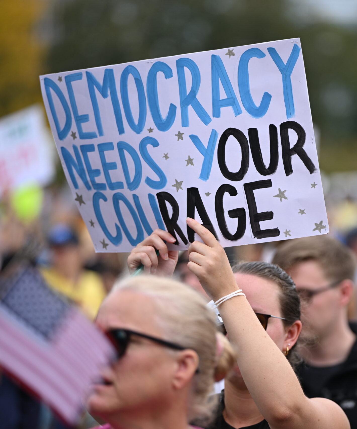 Protesters at a No Kings rally in Chicago, October 2025